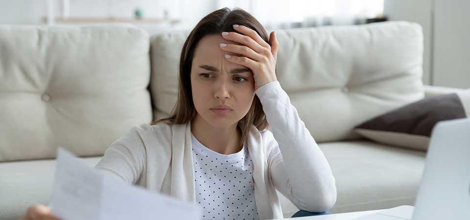 Unhappy Woman Surprised By Supplemental Tax Bill