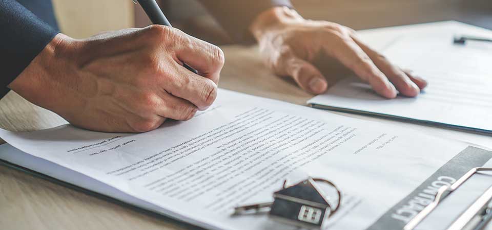 Signing Contract to Sell Home