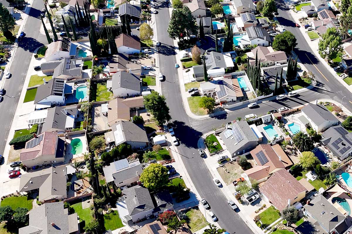 Aerial of HOmes With Swimming Pools in Pinetree