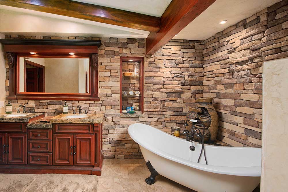 Primary Bathroom Tub and Vanity at 30602 Hasley Canyon Rd