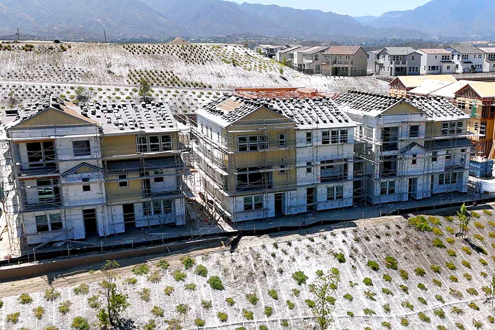 Unfinished Homes Overlooking Sand Cyn Rd in Sage at Sand Canyon
