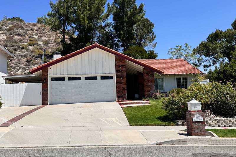 Single Story Home with Red Clay Tile Roof in Sierra Hills Community